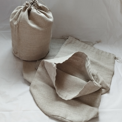 丸底巾着 L白 フェンス柄iichi 日々の暮らしを心地よくするハンドメイドやアンティークのマーケットプレイス