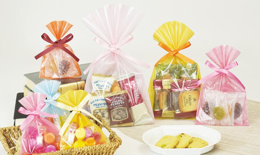 ラッピング袋 袋 透明 リボン付き 不織布袋 ギフト プレゼント