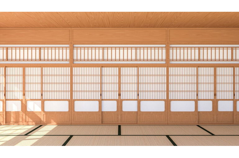 雪見障子とアールの垂れ壁を採用した創作和室。畳に座って、窓越しに四季折々の庭の景色を楽しむ。塗り壁は施主さんが自分で塗った。掘りごたつのカウ