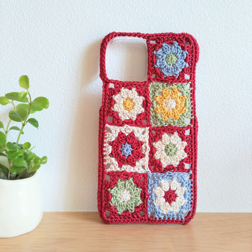受注製作 小花モチーフいっぱいの手編み手帳型スマホケース ミントブルースマホケース・カバー 編みこものmikako 通販12369594Creema クリーマ