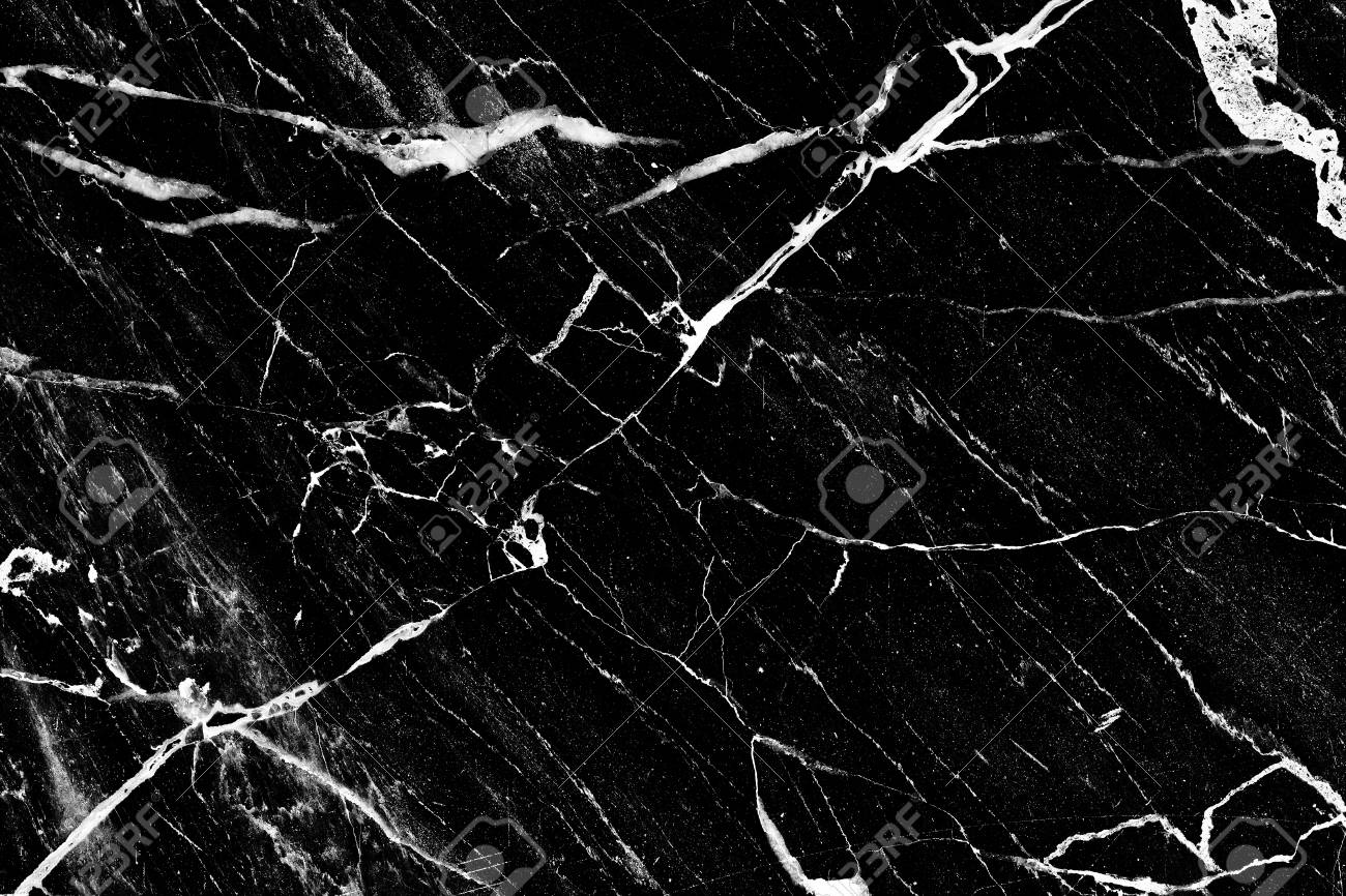 黒い岩の石の大理石の自然なパターン黒の大理石のテクスチャ壁紙の高品質は、トップビュー製品または壁の表示またはモンタージュの背景として使用できますPremium写真