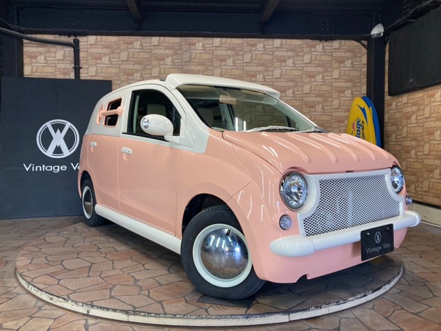 ダイハツ ミラジーノ ジーノ ターボ ウッドコンビステアリング 純正ミニライト１５インチアルミホイール ウッドパネル ピンクボディ レトロ39.0万円 平成13年 2001年沖縄県 中古車 - 価格.com